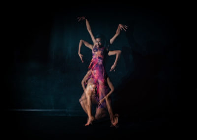 a girl in multiple moves of a dance move with strobe lighting technique